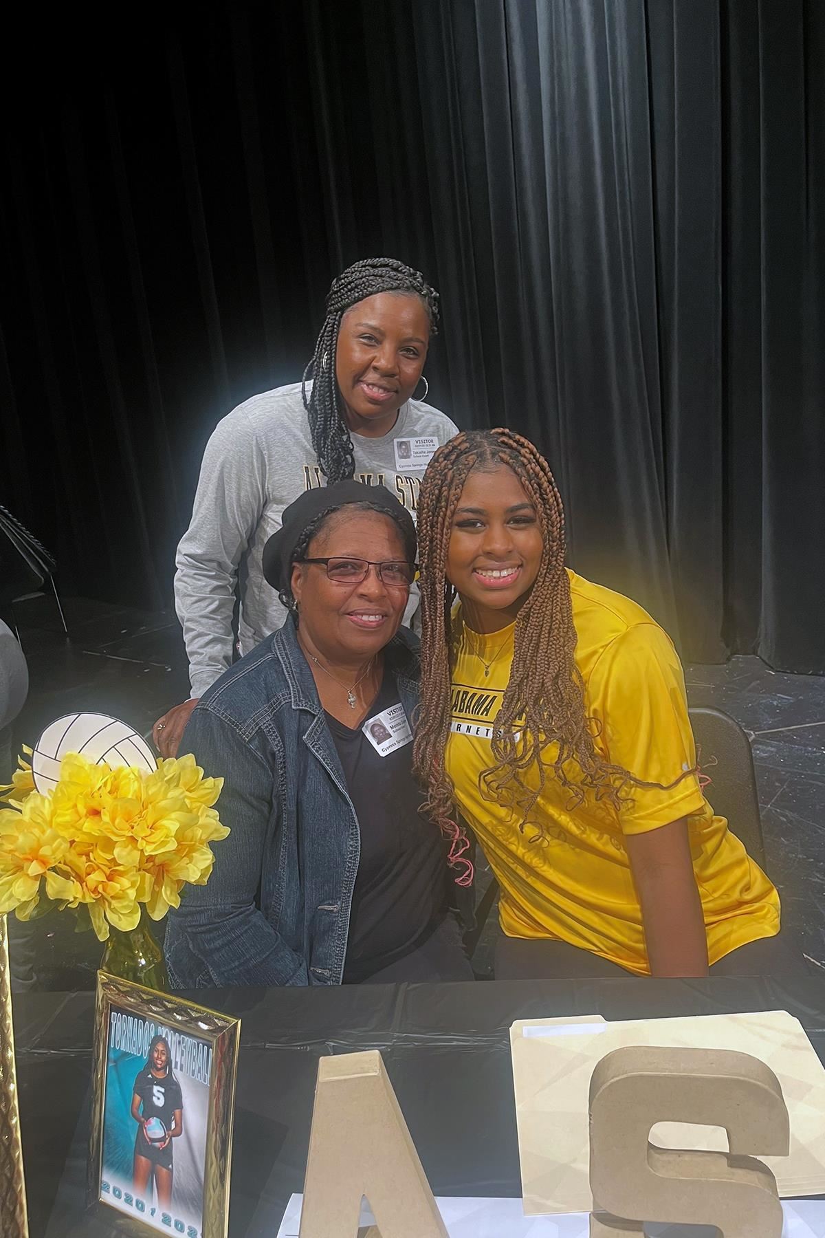 Cy Springs senior Jordyn Jones, right, signed her letter of intent to play volleyball at Alabama State University.